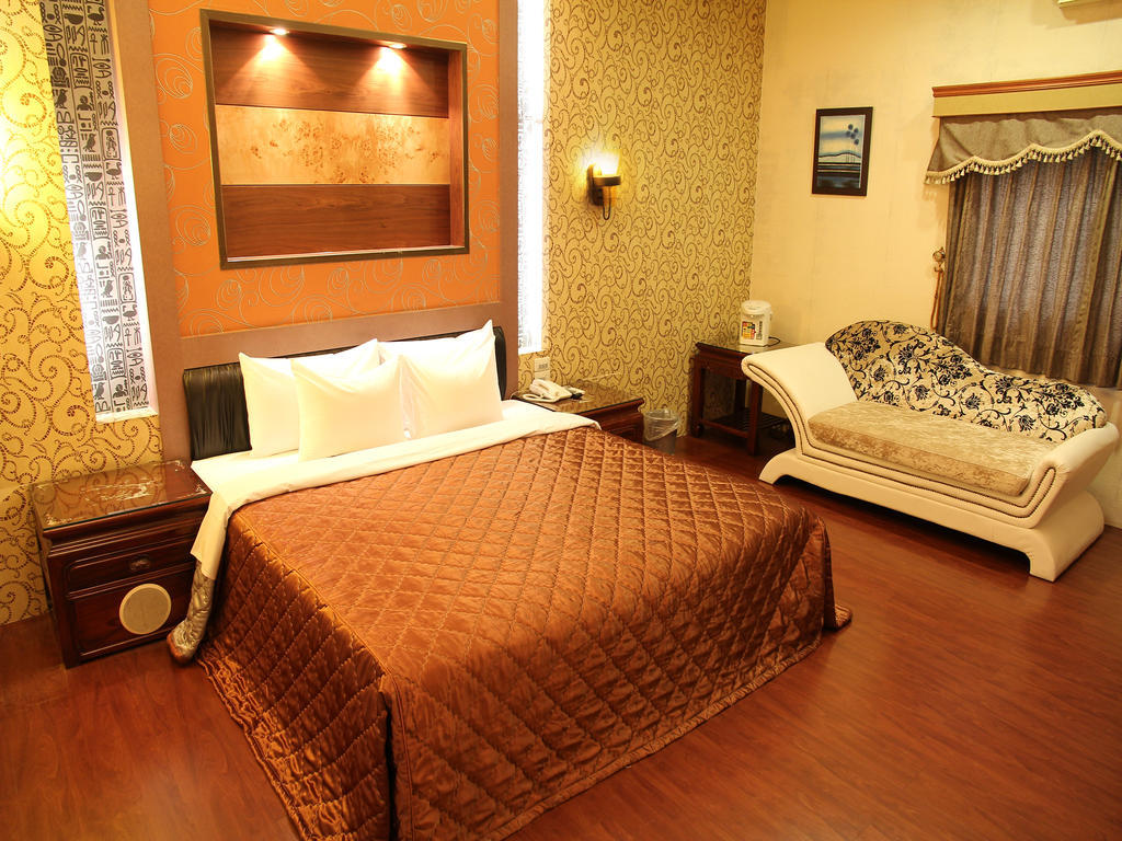 Fukun 5 Motel Джиаоси Стая снимка