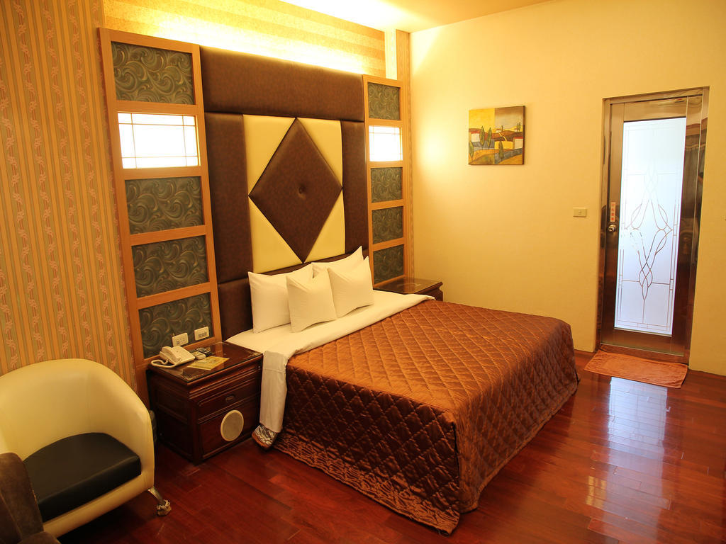 Fukun 5 Motel Джиаоси Стая снимка