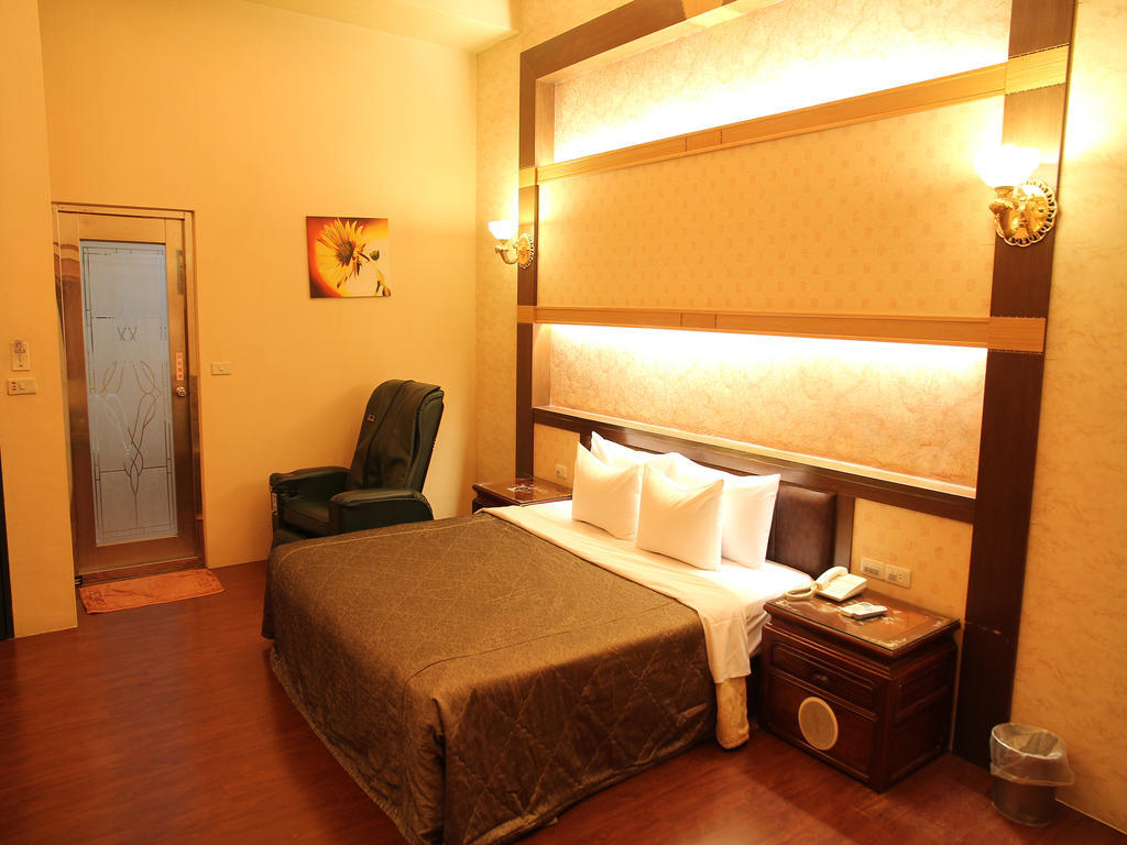 Fukun 5 Motel Джиаоси Стая снимка