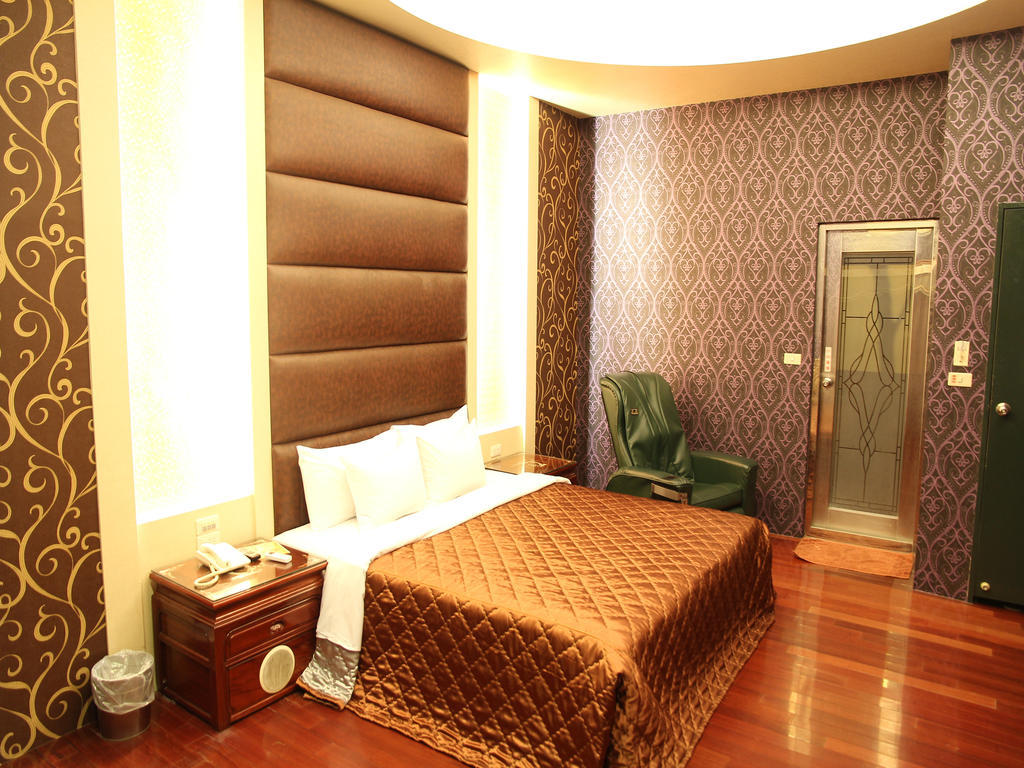Fukun 5 Motel Джиаоси Стая снимка