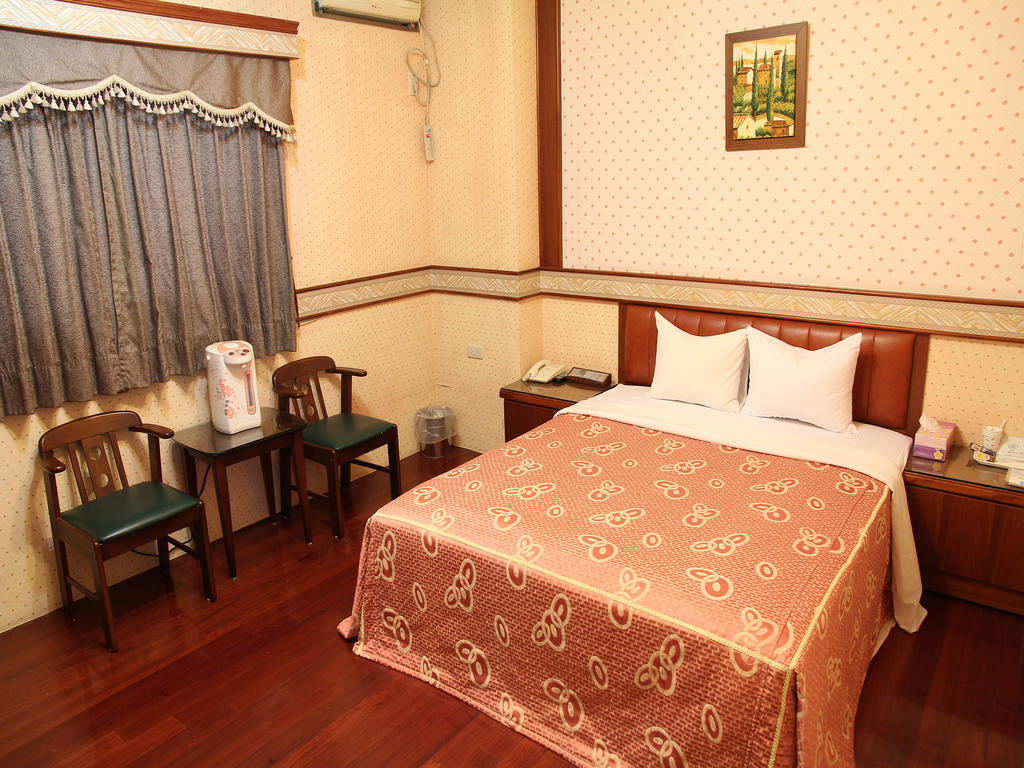 Fukun 5 Motel Джиаоси Стая снимка