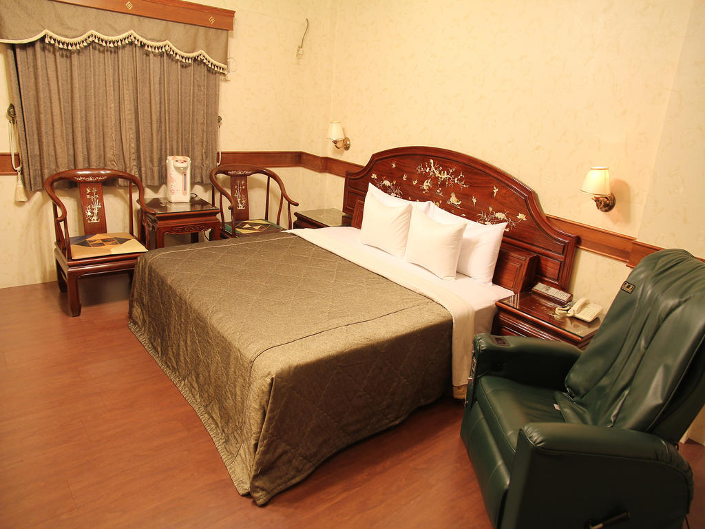 Fukun 5 Motel Джиаоси Стая снимка