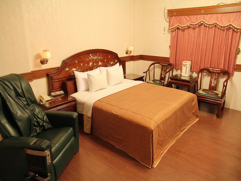 Fukun 5 Motel Джиаоси Стая снимка