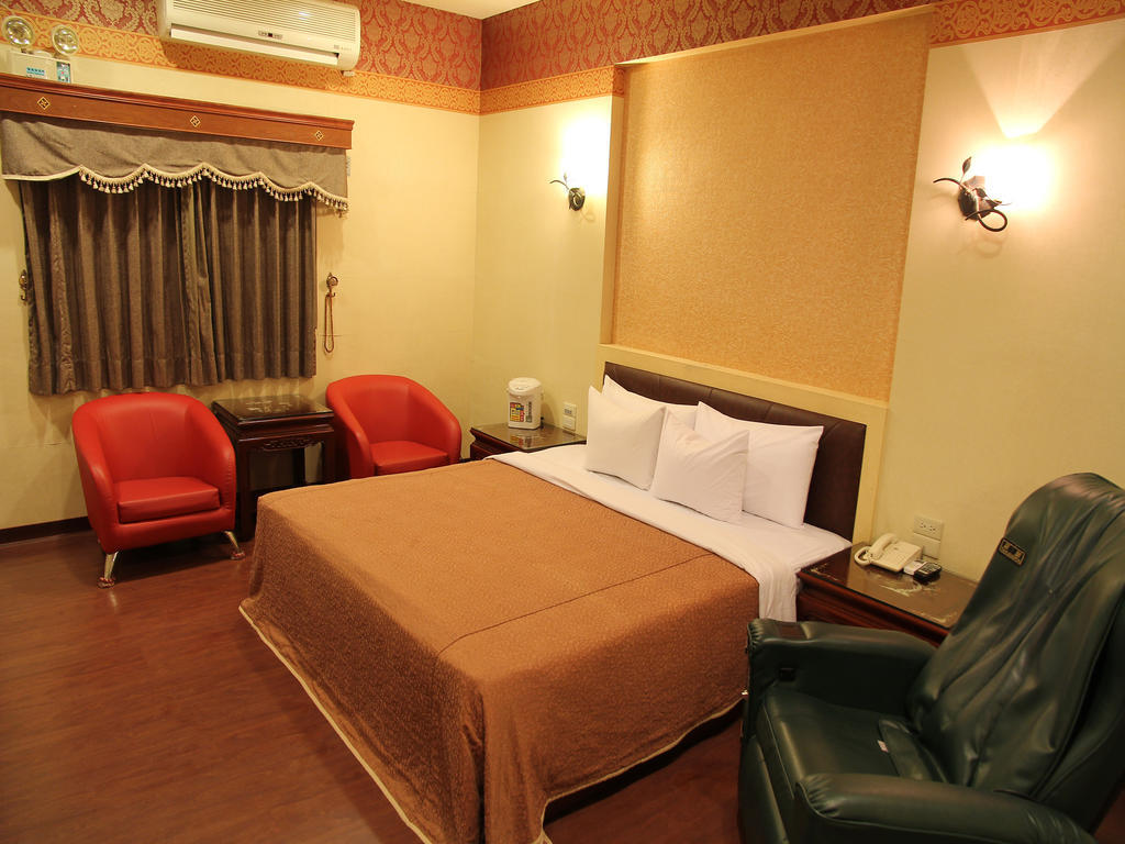 Fukun 5 Motel Джиаоси Стая снимка